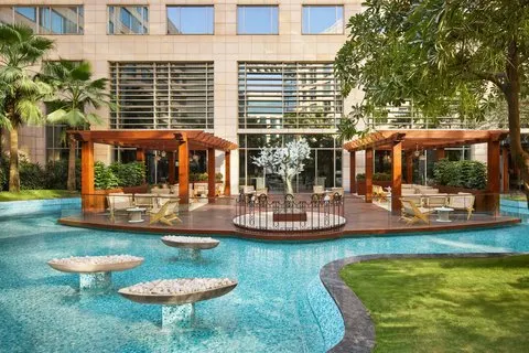 Poolside cabana seating at JW Marriott, New Delhi Aerocity