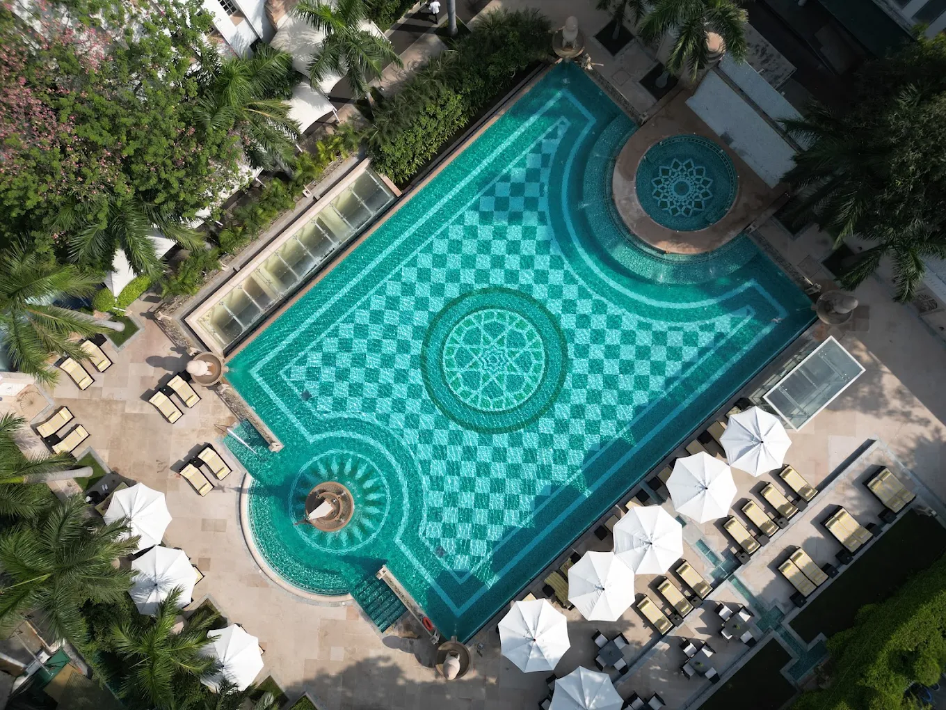 Aerial view of the mosaic pool, cabanas and gardens on the eight-acre grounds of The Imperial, New Delhi